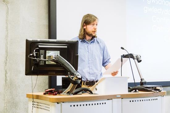 James January-McCann giving a lecture.